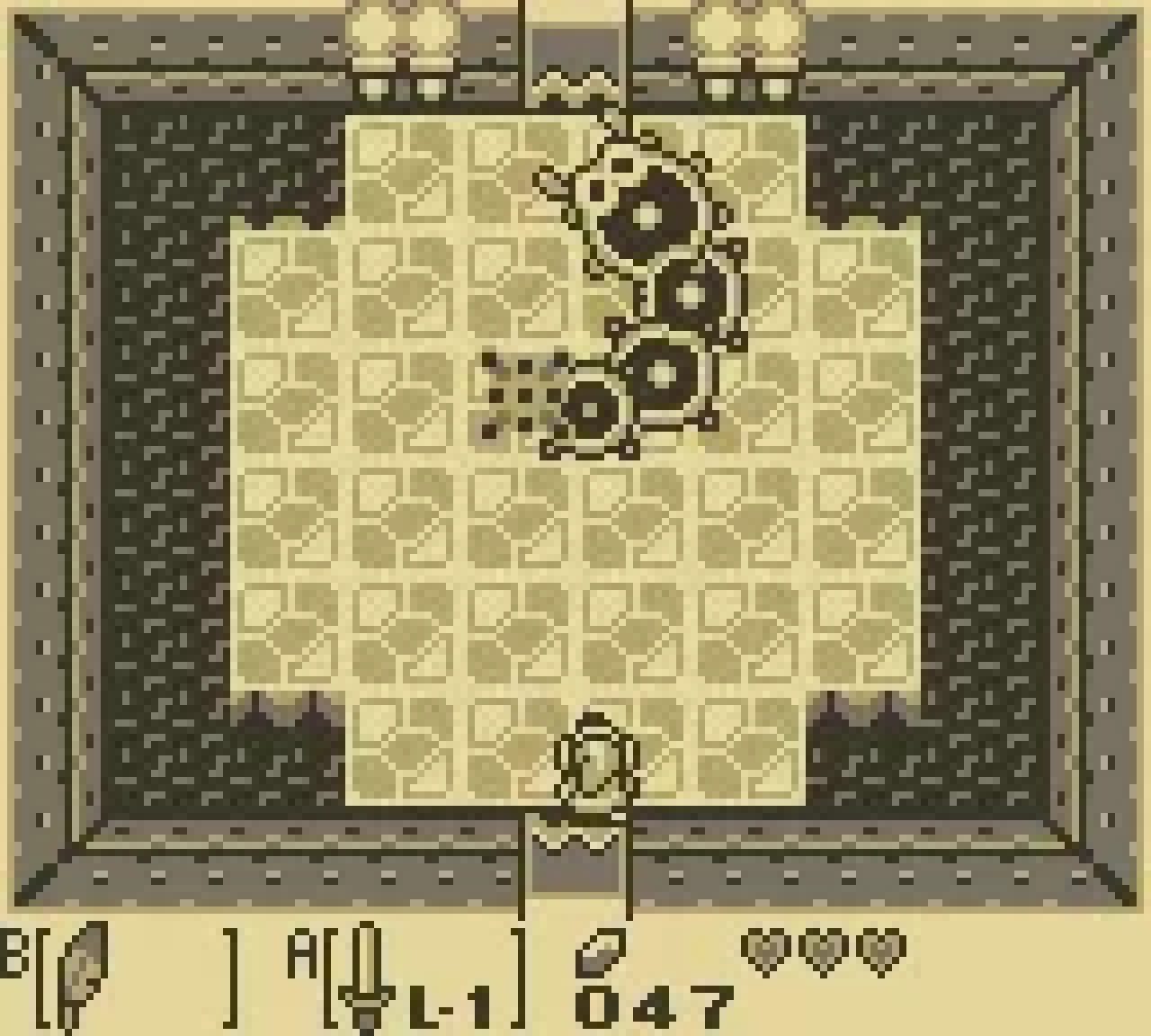 Link fighting Moldorm, the first boss in Tail Cave