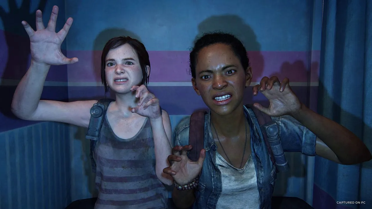 Ellie and Riley pulling faces in a photo booth in an abandoned mall