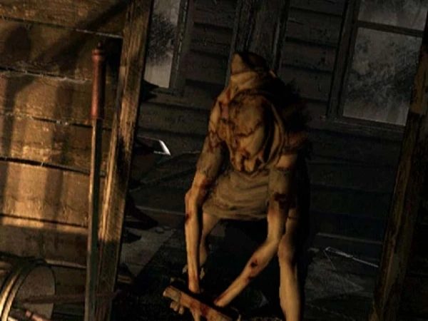Lisa Trevor in chains inside the abandoned cabin behind the Spencer Mansion, Resident Evil remake