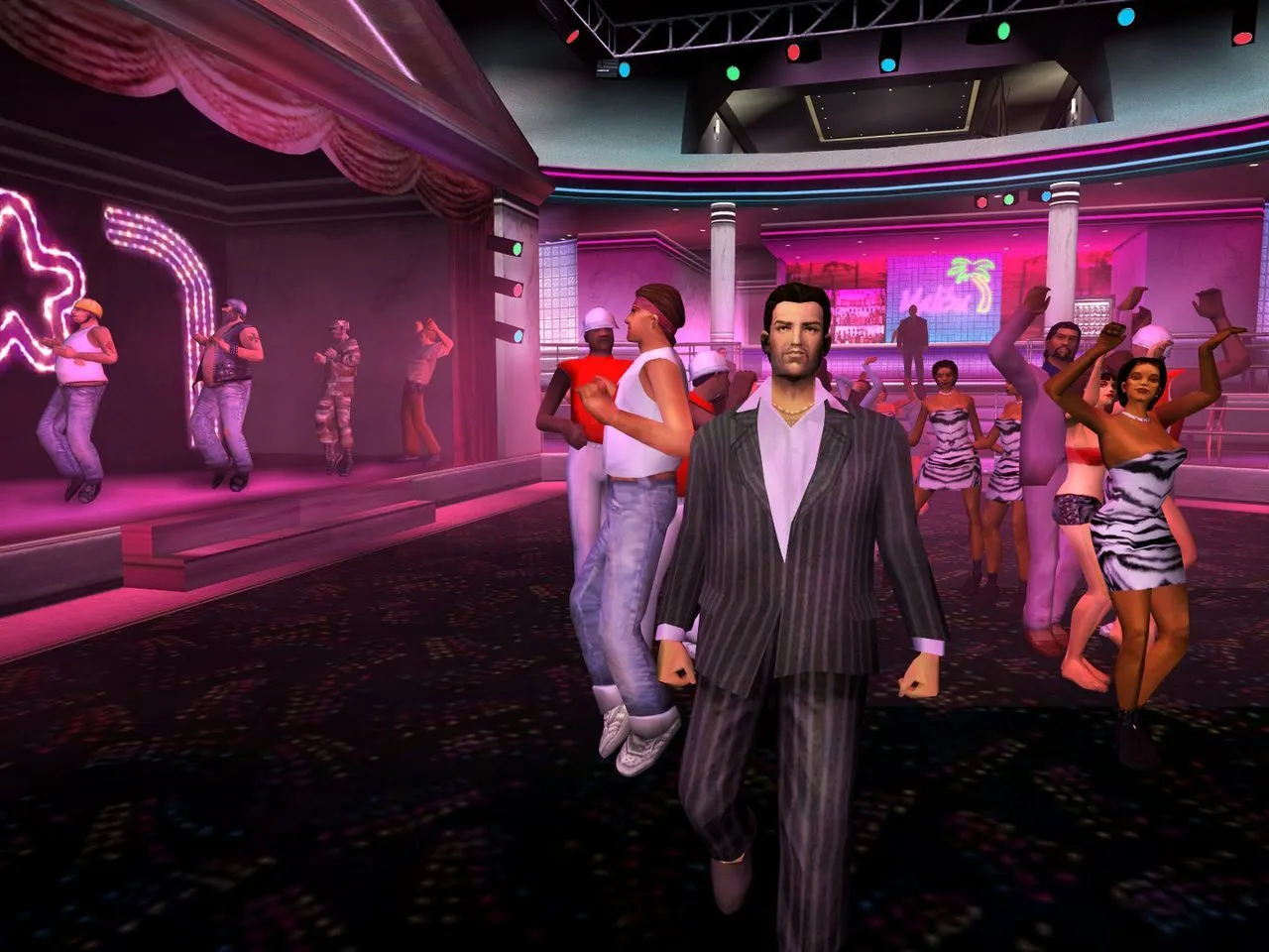 Tommy Vercetti in a suit at a lively nightclub in Vice City