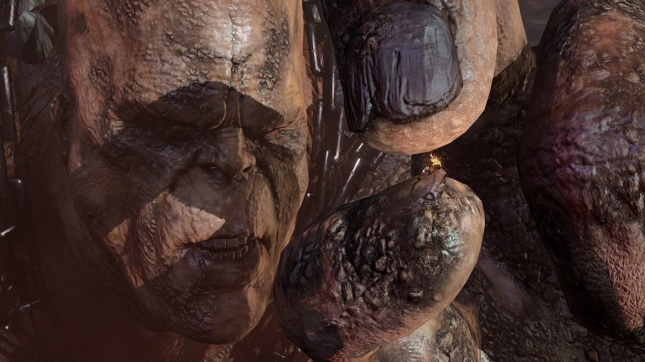Kratos leo trên cơ thể khổng lồ của Titan Cronos tại Tartarus trong God of War III