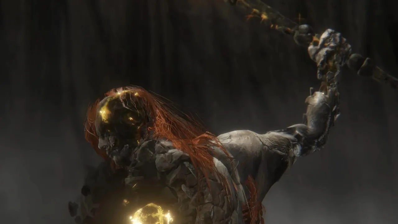 Radagon brandishing his hammer, the Elden Ring's sigil glowing in his chest