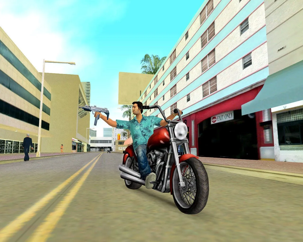 Tommy Vercetti riding a motorcycle while holding an Uzi on the streets of Vice City