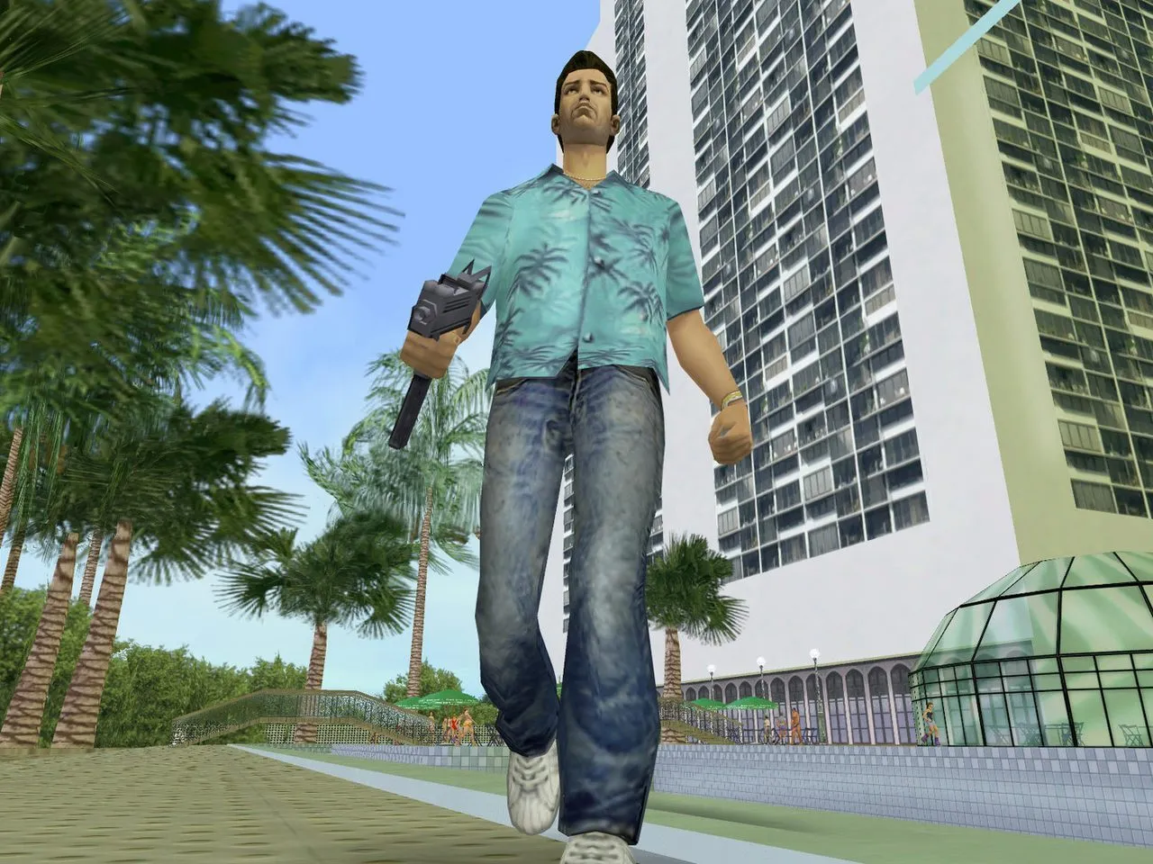 Tommy Vercetti walking with a gun in his hand in Vice City